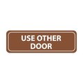 National Marker Co Architectural Sign - Use Other Door AS105